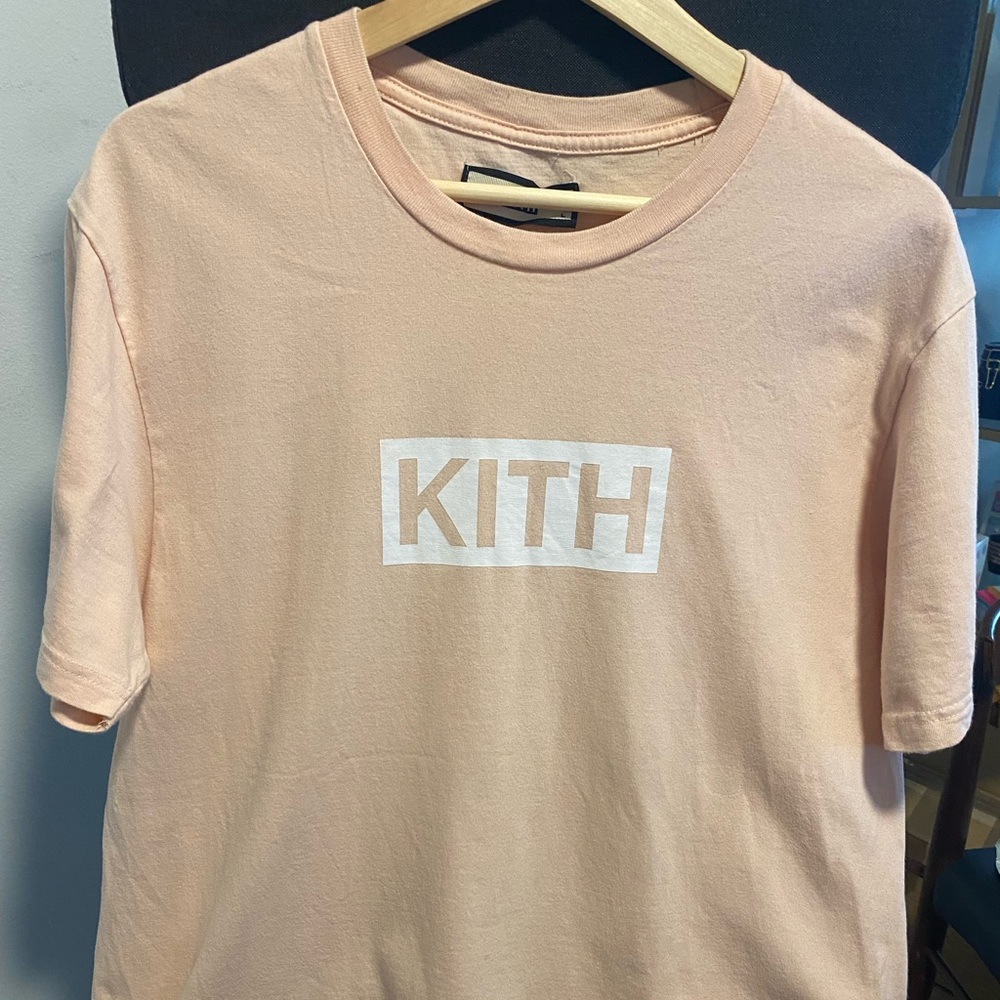 KITH classic pink t-shirt.